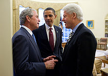 220px-Obama,_Bush,_and_Clinton_discuss_the_2010_Haiti_earthquake
