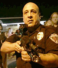 Lt_Ray_Albers_points_rifle_in_Ferguson